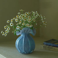 Round-bellied glass vase by TRLab Shop, clear transparent design with smooth curved shape for floral arrangements.