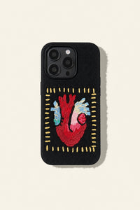 Embossed heart embroidery on a phone case from TRLab Shop, showcasing detailed floral stitching design.