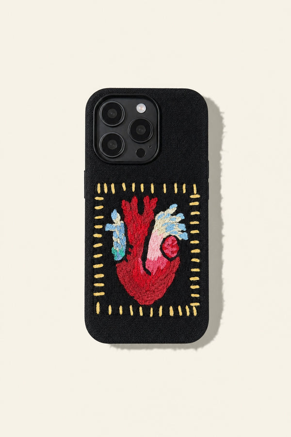 Embossed heart embroidery on a phone case from TRLab Shop, showcasing detailed floral stitching design.