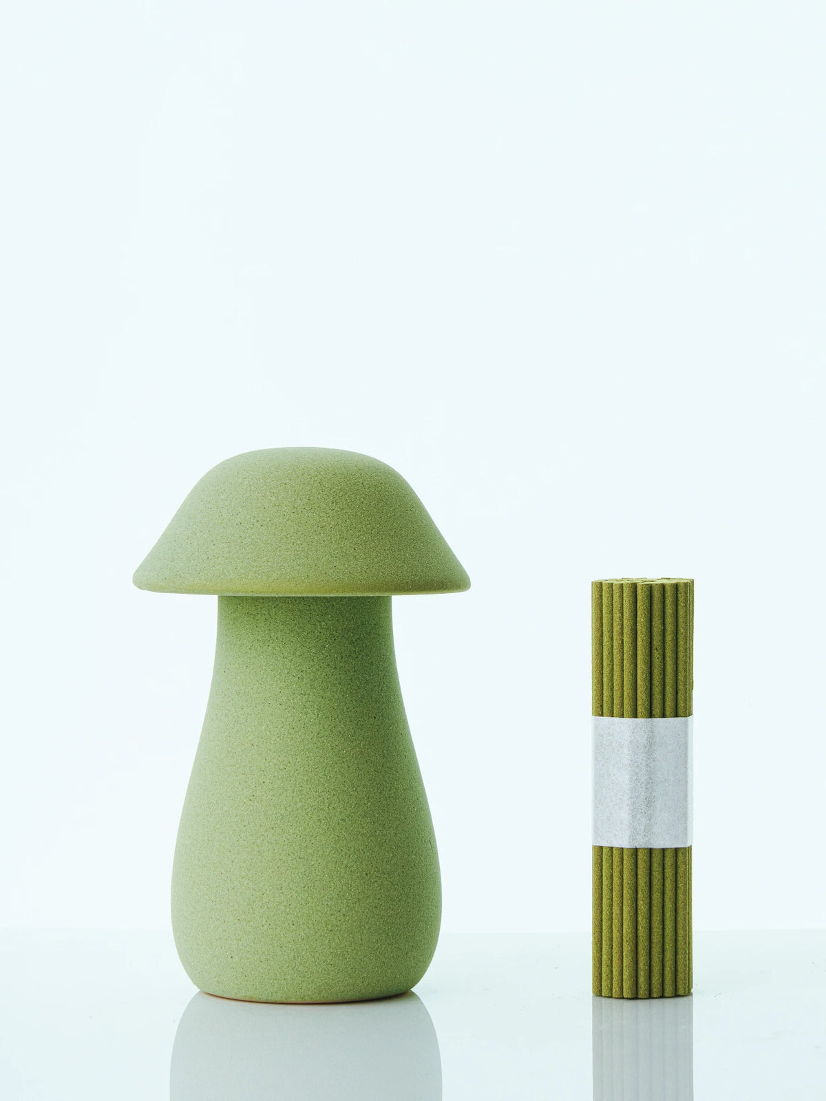 Colorful short incense mushroom gift box by YRGD with vibrant, multicolored mushroom-shaped incense holders in a decorative box.