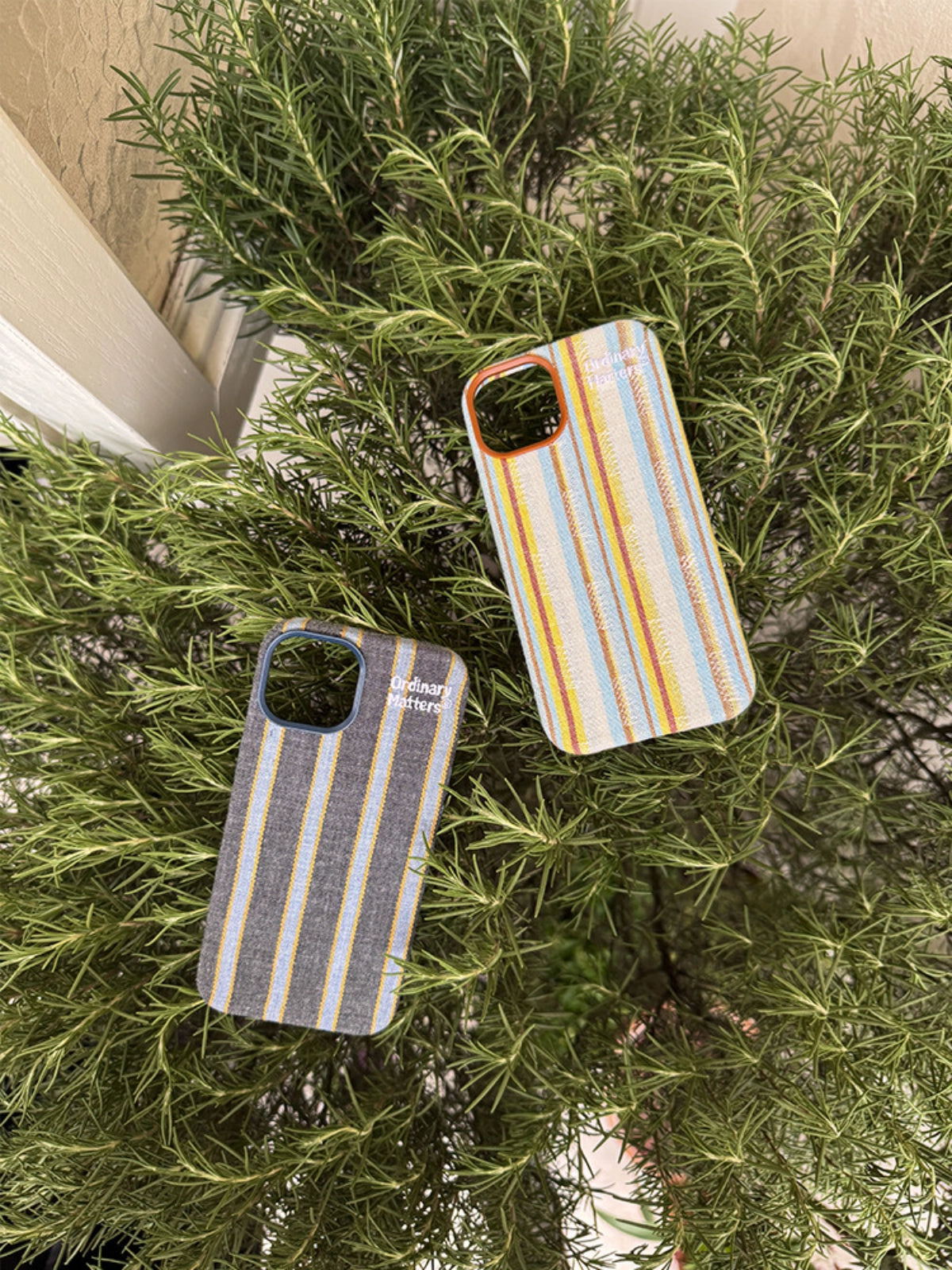 Striped fabric phone case by TRLab Shop featuring a colorful, woven design for a stylish and protective accessory.