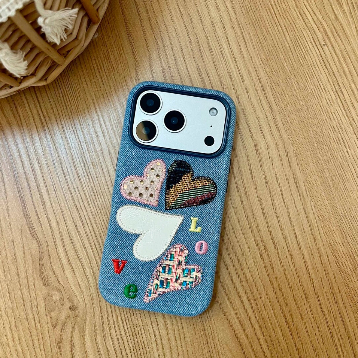 Love Heart embroidered phone case by TRLab Shop, featuring colorful heart embroidery on a protective smartphone cover.
