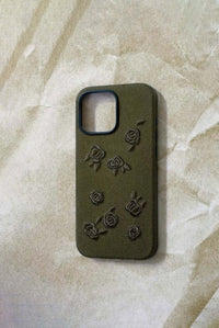 Green phone case with embroidered rose design from TRLab Shop, showcasing detailed floral embroidery on smooth material.