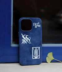 Blue shamanic embroidered phone case with intricate tribal designs, fits a smartphone, featuring detailed embroidery and vibrant colors.