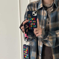 Colorful embroidered phone case with letter designs from TRLab Shop, showcasing vibrant fabric and detailed stitching.