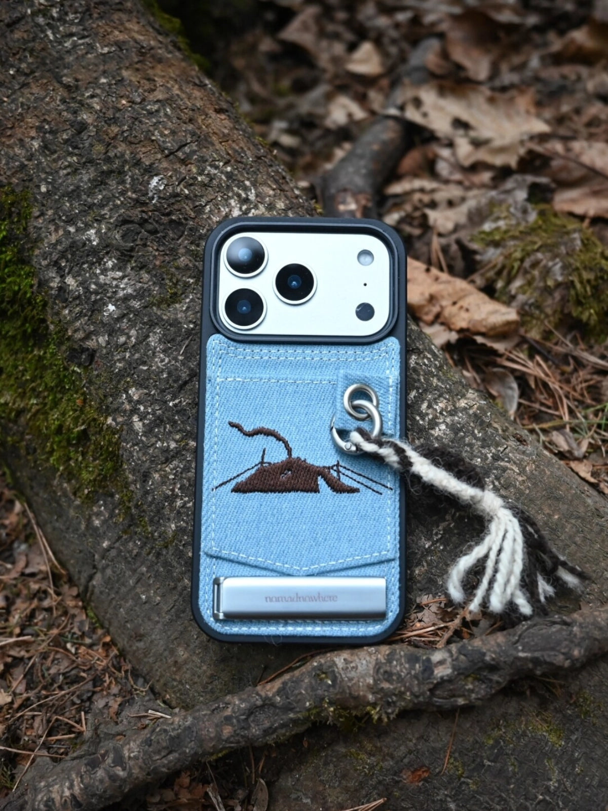 Embroidered tent phone case by TRLab Shop with colorful embroidered design, slim protective cover for smartphone.