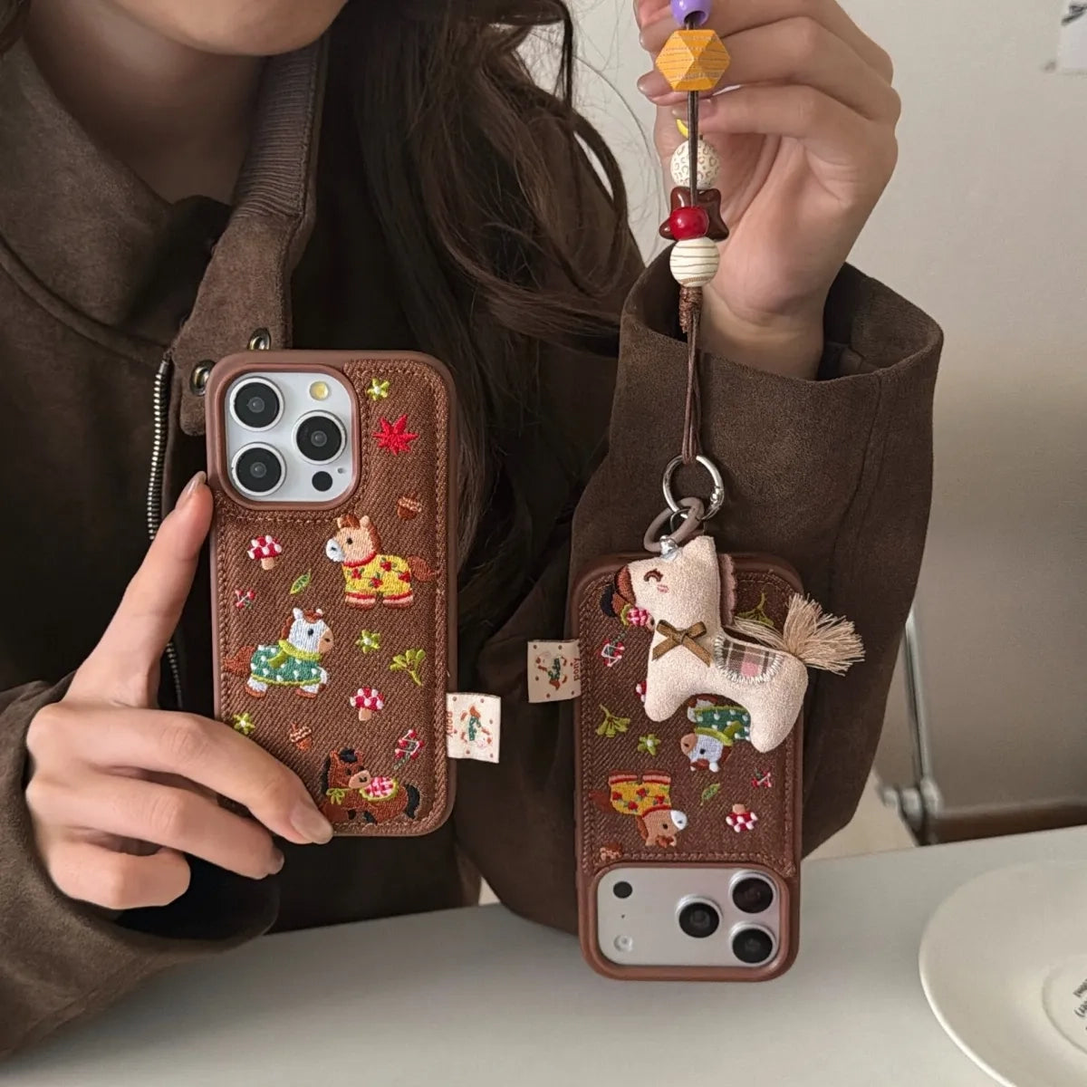 Embossed pony embroidery on a TRLab Shop smartphone case, featuring colorful stitched horse design on durable protective cover.