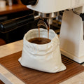 Ceramic burlap cup with textured, rustic design from TRLab Shop, perfect for coffee or tea in a stylish, natural-inspired ceramic mug.