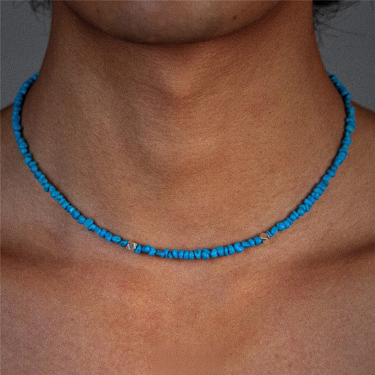 Irregular turquoise beaded necklace from TRLab Shop featuring uneven round beads and a stylish, handcrafted design.