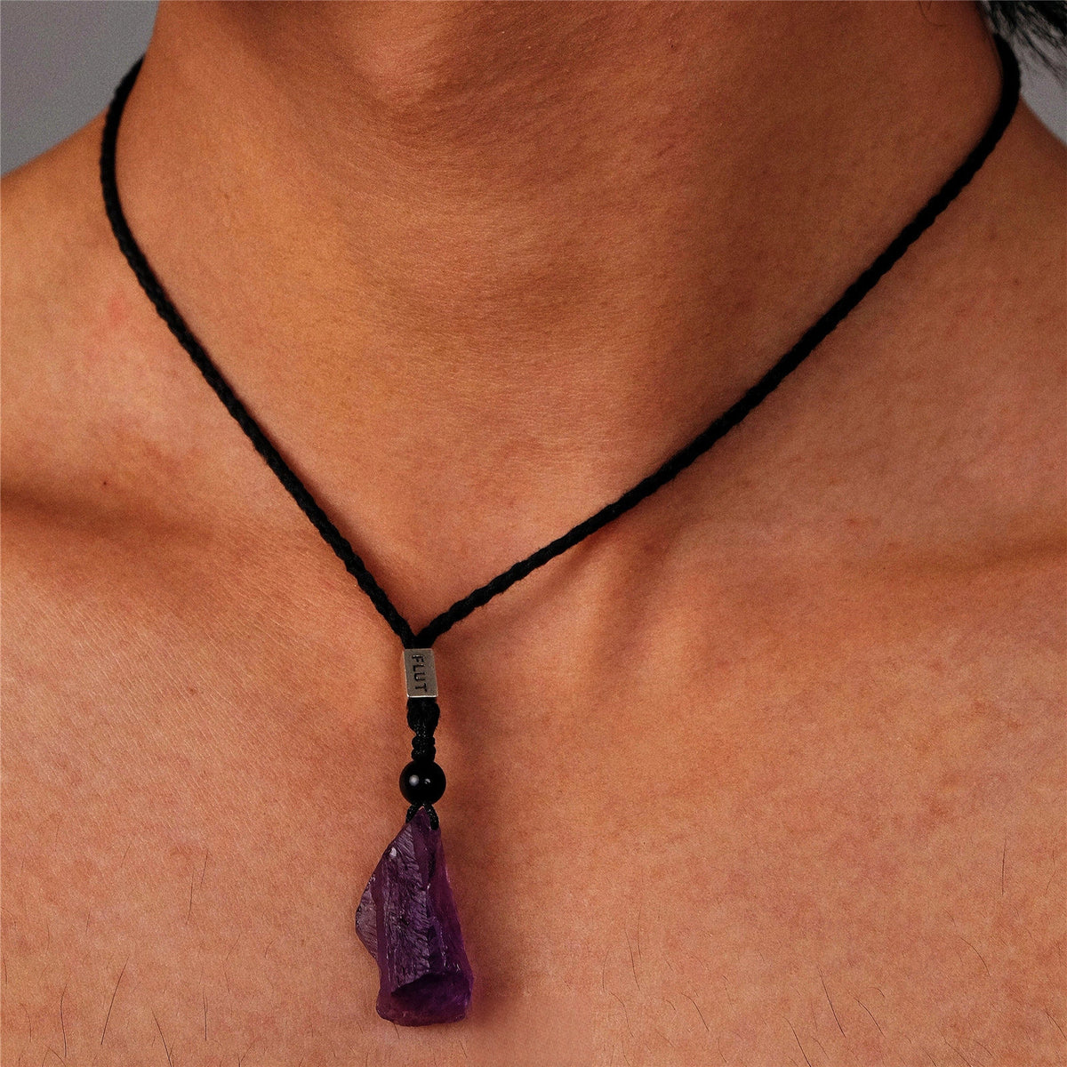 Brazilian Amethyst necklace featuring a polished purple gemstone pendant on a delicate silver chain by TRLab Shop