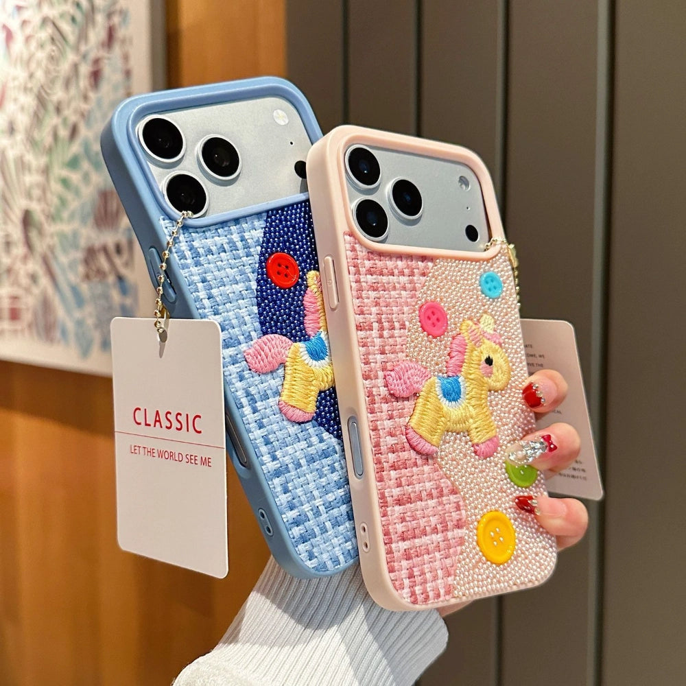 Beadworks embroidered unicorn phone case with colorful bead detailing on a clear protective cover.