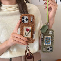 Embroidered tulip phone case by TRLab Shop with colorful floral embroidery on a protective phone cover.