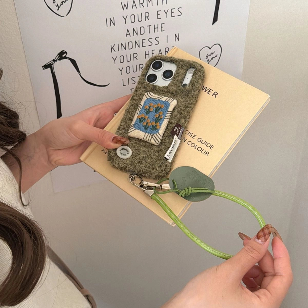 Embroidered tulip design on TRLab Shop phone case, protective cover with colorful floral embroidery for smartphones.