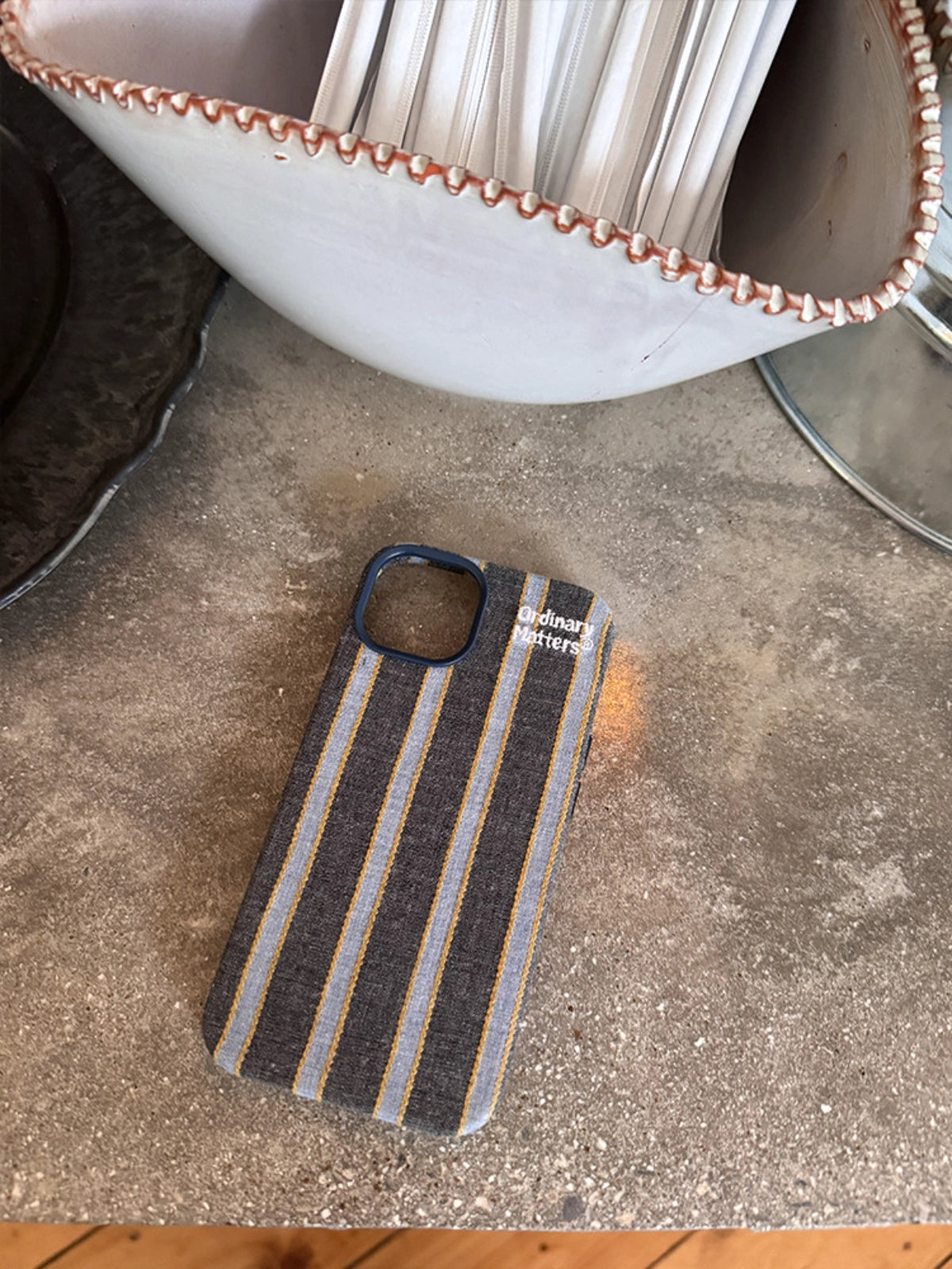 Striped fabric phone case by TRLab Shop with colorful horizontal stripes and soft fabric texture.