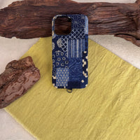 Tie-dyed fabric phone case by TRLab Shop featuring a colorful, swirling pattern and soft protective material.