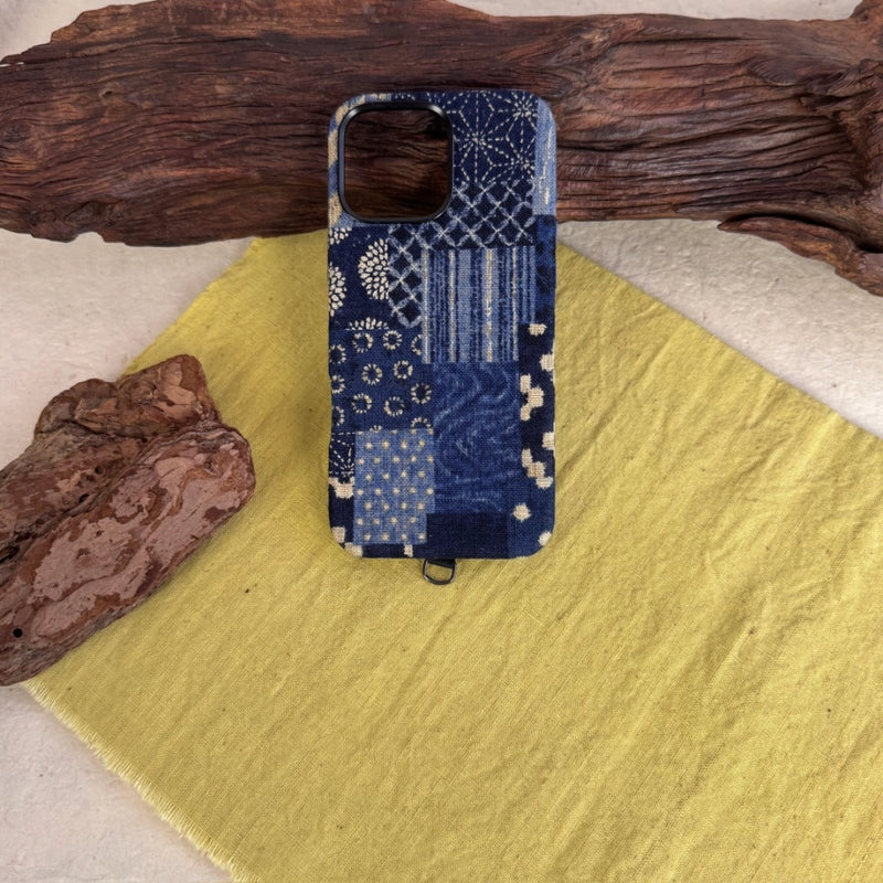 Tie-dyed fabric phone case by TRLab Shop featuring a colorful, swirling pattern and soft protective material.