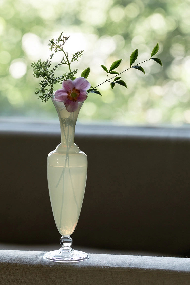 Elegant waisted glass vase by TRLab Shop, featuring a clear, curved design suitable for floral arrangements and home decor.