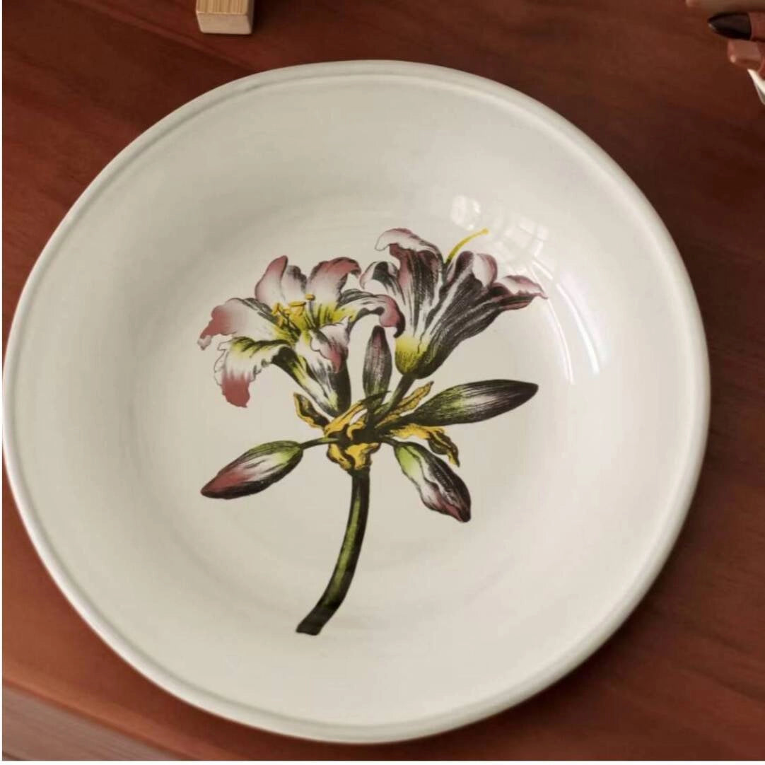 Floral ceramic plate by TRLab Shop featuring colorful flower patterns on a white background.