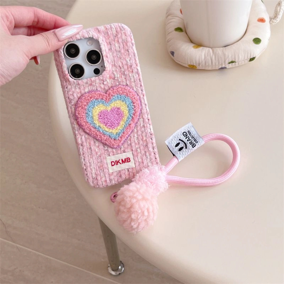 Pink Love Heart embroidered phone case with floral design, compatible with smartphones, featuring embroidered love heart detail.