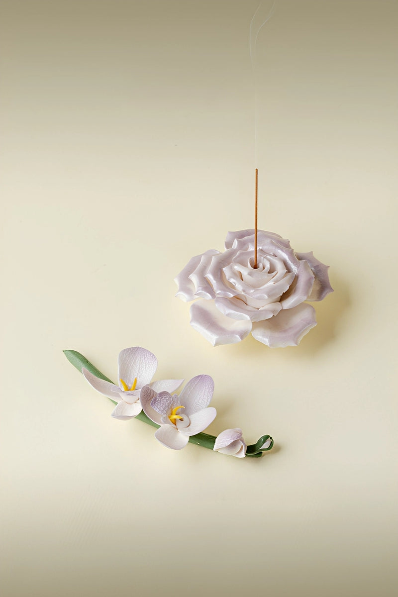 Handcrafted Magnolia incense holder from TRLab Shop, featuring a detailed ceramic design with a hollowed center for holding incense sticks.