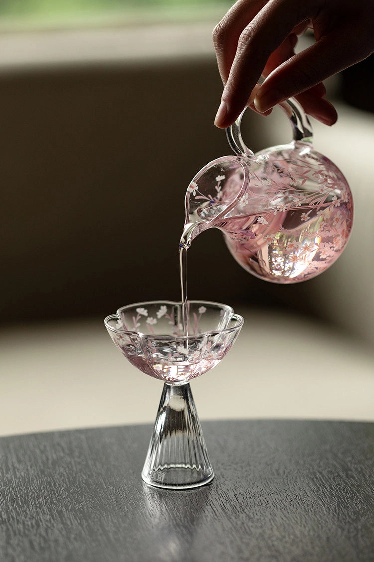 Pink Sakura Blossom glassware by TRLab Shop featuring delicate cherry blossom designs on clear glass for elegant drinking.