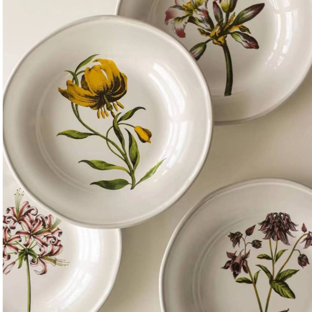 Decorative floral ceramic plate with colorful flower pattern, perfect for serving or display from TRLab Shop.