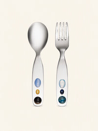 Candy Jade stainless steel spoon and fork set from SoftServe dinnerware, featuring sleek, shiny utensils on a neutral background.