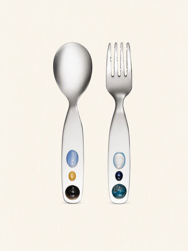 Candy Jade stainless steel spoon and fork set from SoftServe dinnerware, featuring sleek, shiny utensils on a neutral background.