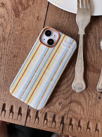 Striped fabric phone case by TRLab Shop featuring a colorful striped design and soft protective material.