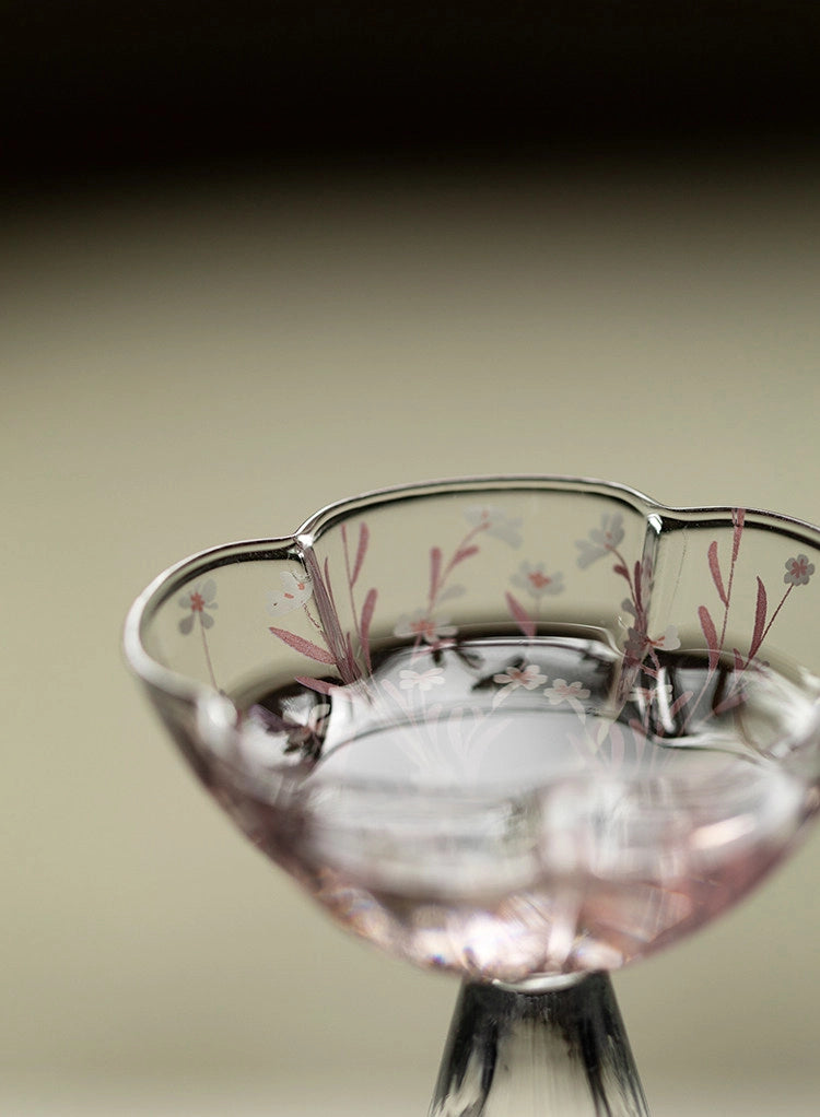 Pink Sakura Blossom glassware by TRLab Shop featuring a delicate pink floral design on clear glass, perfect for elegant dining.
