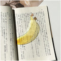 Translucent fruit-shaped acrylic bookmark with colorful fruit illustrations, ideal for marking pages in books.