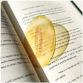 Translucent fruit-shaped acrylic bookmark with colorful fruit illustrations, ideal for marking pages in books.