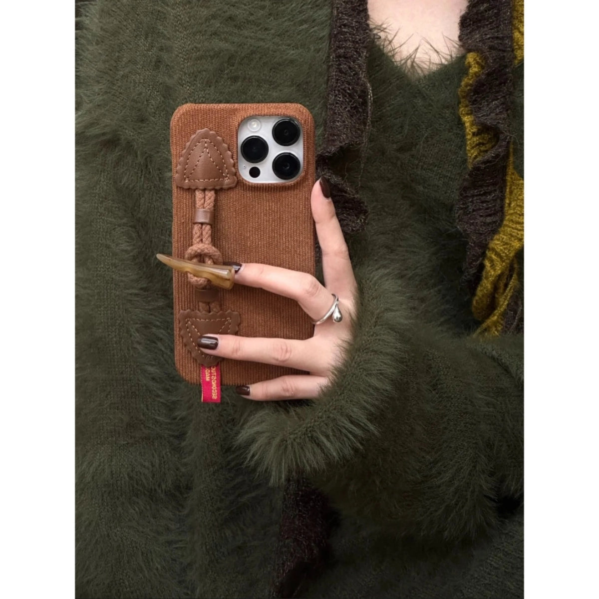 Red striped corduroy fabric phone case with toggle button closure, designed by TRLab Shop, shown with the case open and closed.