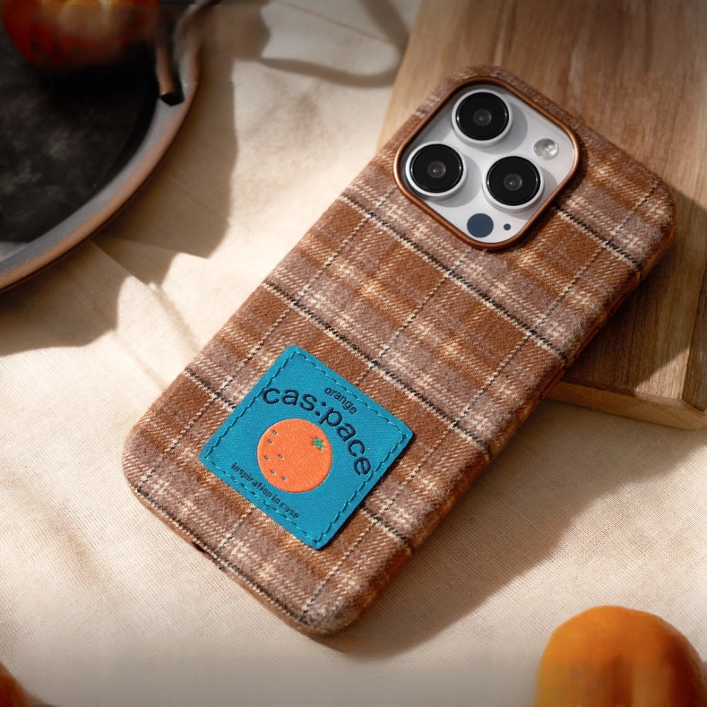 Brown plaid fabric phone case by TRLab Shop with a textured pattern and snug fit for smartphones.