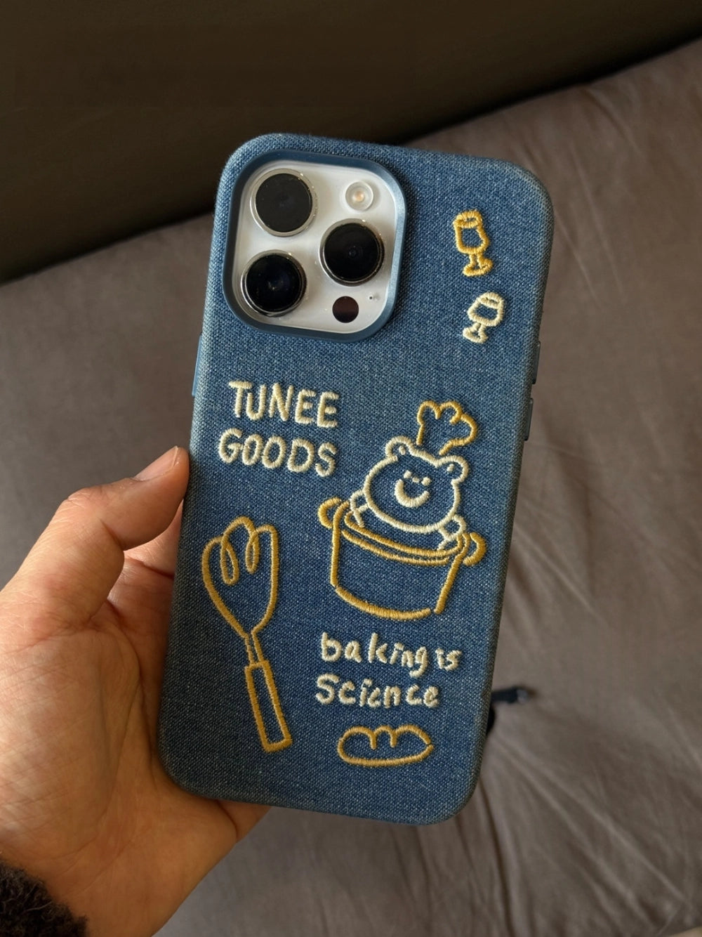 Embroidered chef bear design on TRLab Shop phone case, durable protective cover for smartphones with detailed stitching.