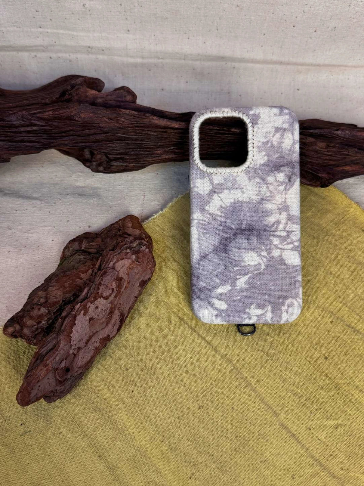 Colorful tie-dyed fabric phone case by TRLab Shop, featuring a vibrant, soft textile design for smartphones.