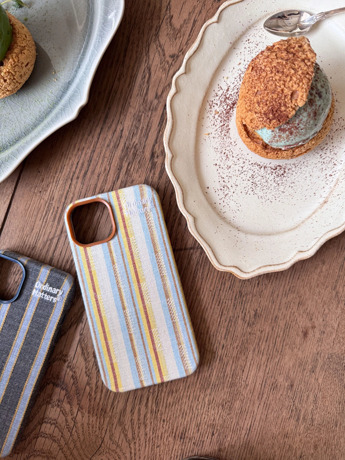 Striped fabric phone case by TRLab Shop featuring a colorful striped pattern and soft fabric material.