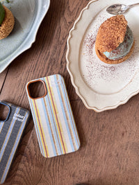 Striped fabric phone case by TRLab Shop featuring a colorful striped pattern and soft fabric material.
