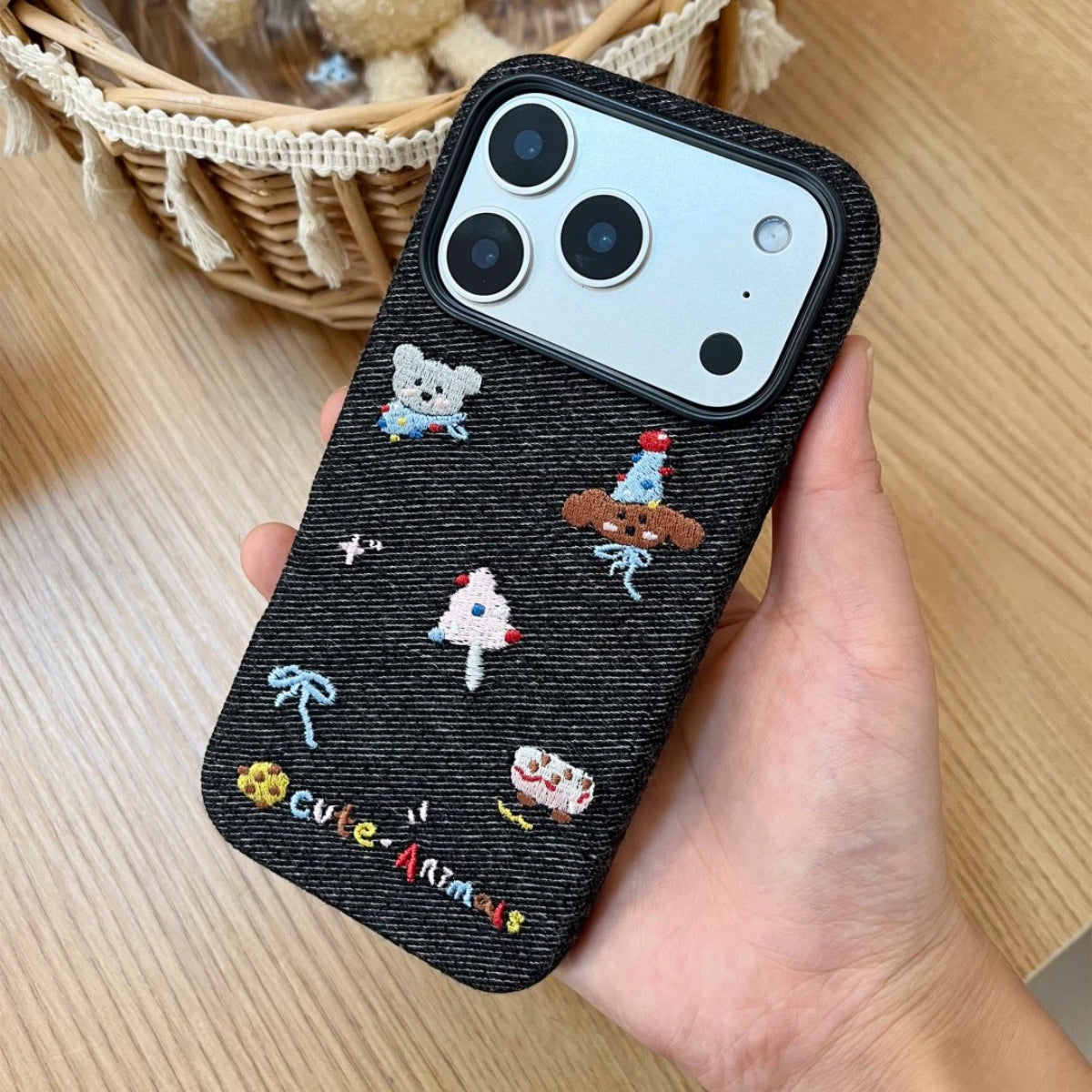 Embroidered animal phone case from TRLab Shop featuring colorful animal designs on a protective smartphone cover.