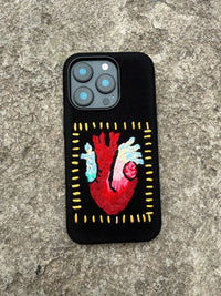 Embroidery heart design on a TRLab Shop phone case with colorful floral embroidery on a sleek, protective accessory.