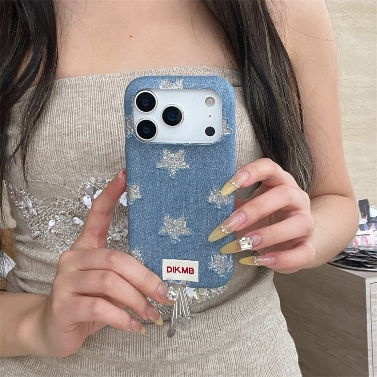 Shimmering Starlight denim phone case by TRLab Shop with glittery star design on a durable denim background.