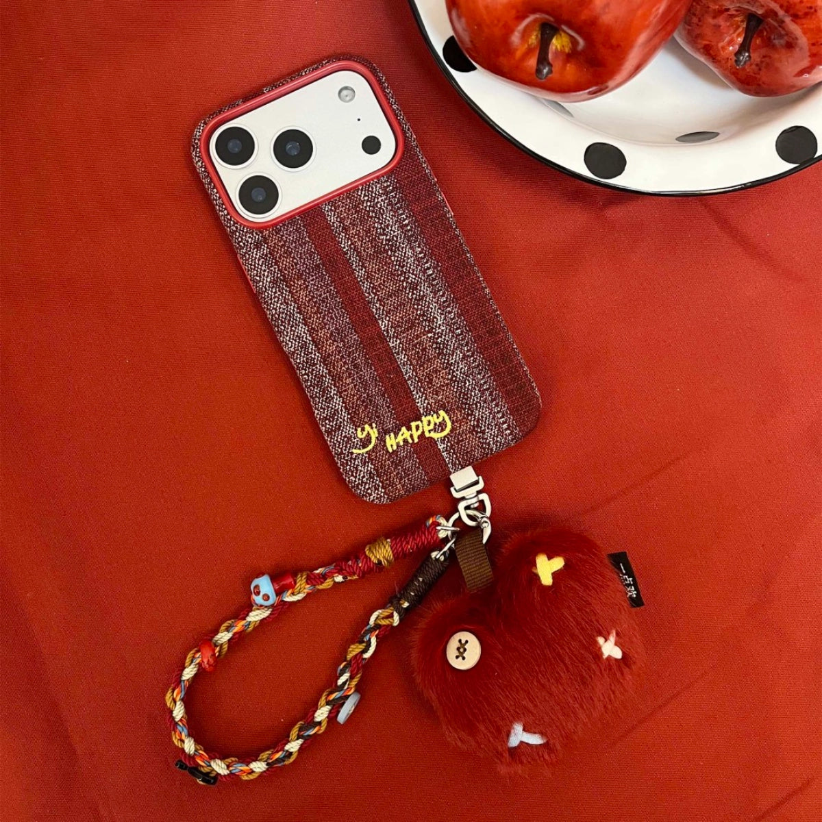 Embroidered Happy Letters phone case by TRLab Shop featuring colorful stitched lettering on a protective smartphone cover.