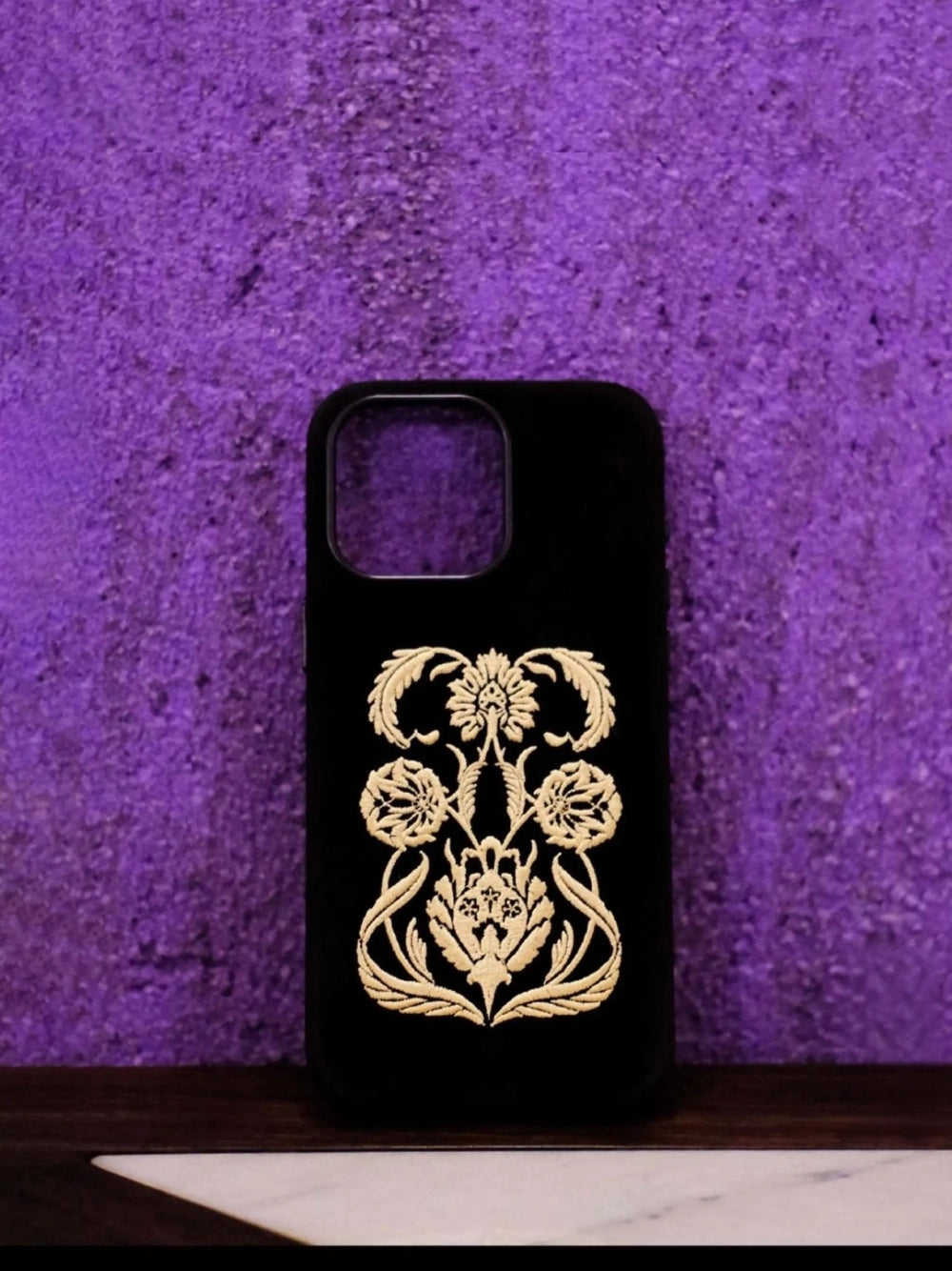 Black shamanic embroidered phone case with intricate tribal designs, made by TRLab Shop, displayed on a white background.