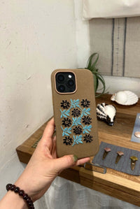 Vine and floral embroidered phone case by TRLab Shop, featuring intricate floral embroidery on a protective case.