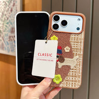 Tweed plaid puppy embroidered phone case by TRLab Shop featuring a charming dog design on a stylish fabric cover.
