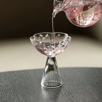 Pink Sakura Blossom glassware from TRLab Shop featuring delicate cherry blossom designs on clear glass for elegant beverage presentation.
