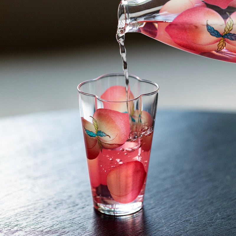 Spring Peach glass tumbler and cold brew bottle from TRLab Shop, featuring clear glass with peach accents and sleek design