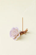 Handcrafted purple-pink camellia-shaped incense holder with intricate details, designed by TRLab Shop.
