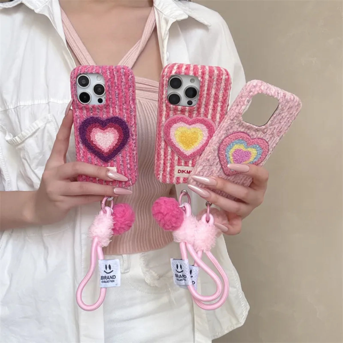 Pink Love Heart embroidered phone case with floral design, compatible with smartphones, featuring decorative heart embroidery.