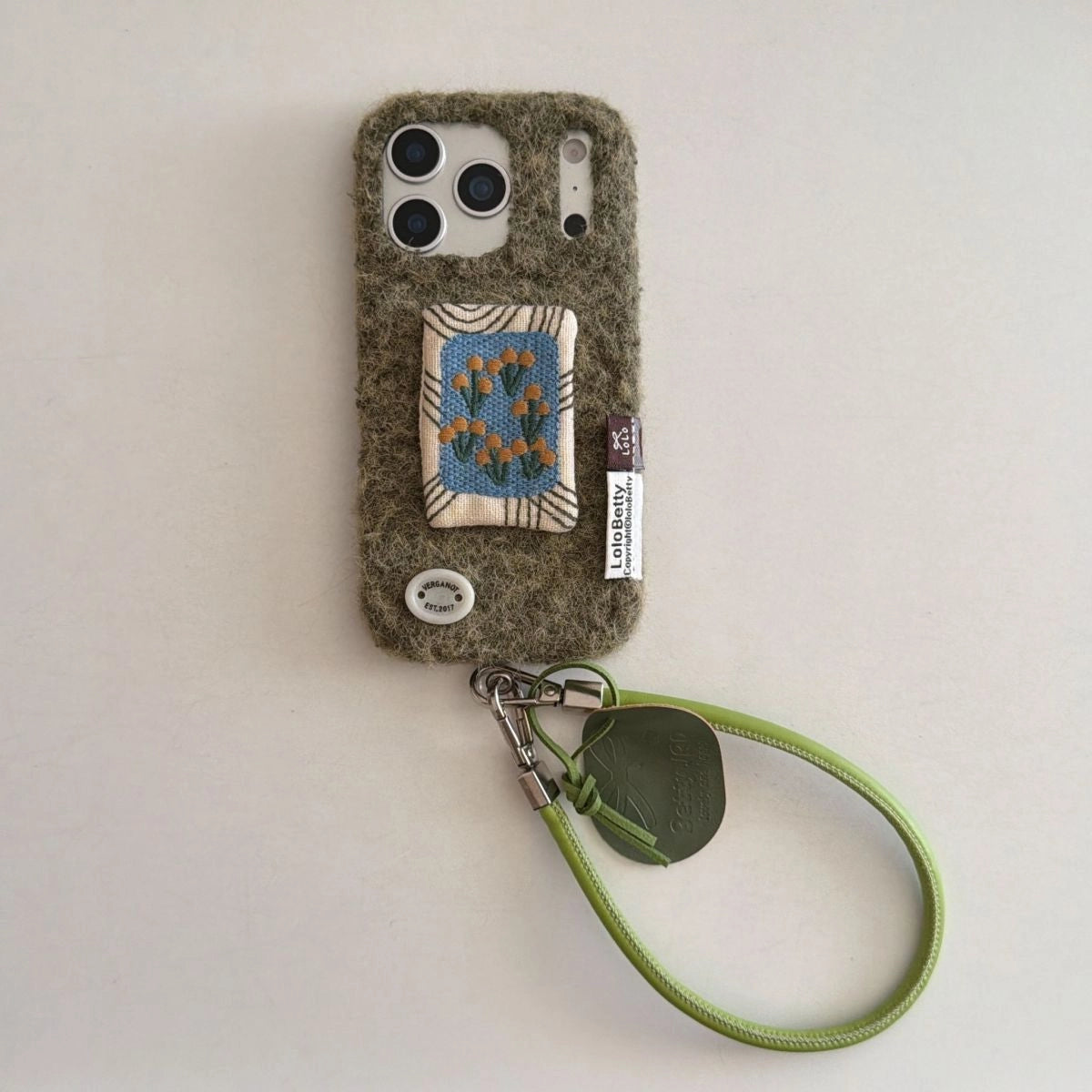 Embroidery tulip design on TRLab Shop phone case, slim protective cover for smartphone with colorful floral pattern.